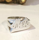 silver name ring with tail